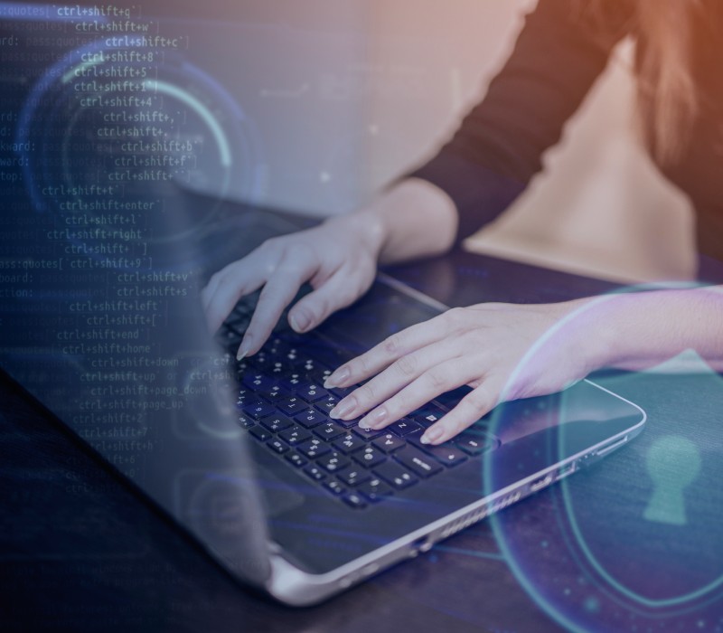 Cybersecurity specialist monitoring threats for a local company