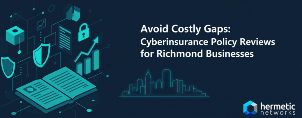 Business professional in Richmond reviewing a cyberinsurance policy document with an IT consultant from Hermetic Networks to identify hidden coverage gaps.